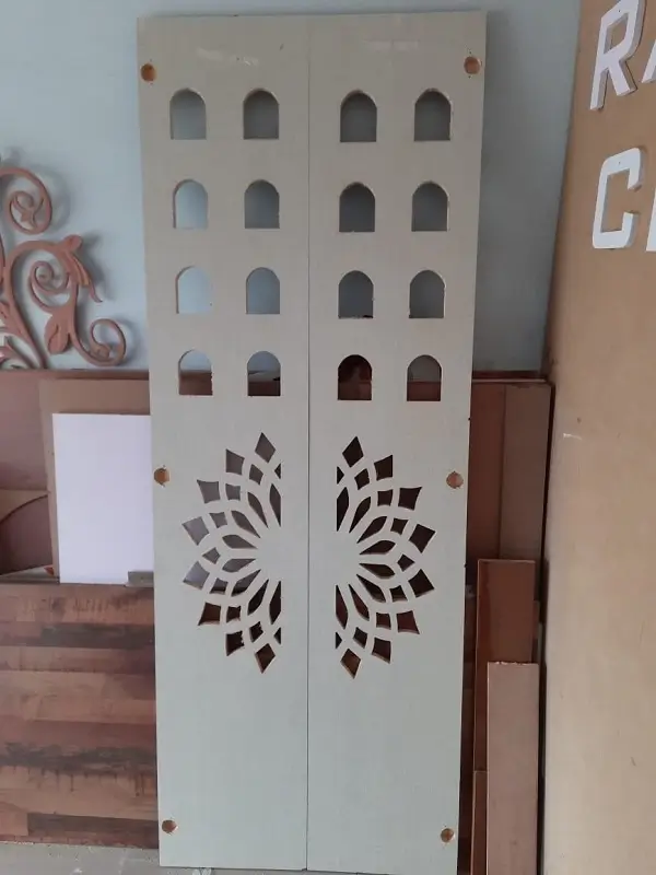 Pooja room design cnc cutting on century plywood with half white decolam work at Chintal, Balanagar, Hyderabad
